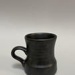 Mug - Black Titian; Crown Lynn Potteries Limited; 1970s; 2024.1.1