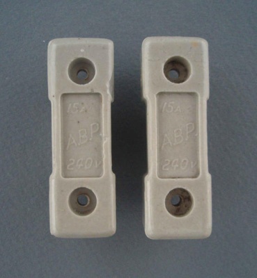 Two oven fuse holders - A.B.P.; Crown Lynn Technical Ceramics Limited; 1940-1980; 2009.1.1490.1-2