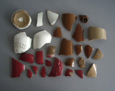 Ceramic bottle shard x 28; Crown Lynn Potteries Limited; 1940-1960; 2009.1.2050.1-28