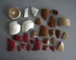 Ceramic bottle shard x 28; Crown Lynn Potteries Limited; 1940-1960; 2009.1.2050.1-28