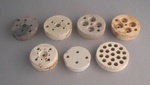 Ceramic insulators x7; Crown Lynn Technical Ceramics Limited; 1940-1980; 2009.1.1962.1-7