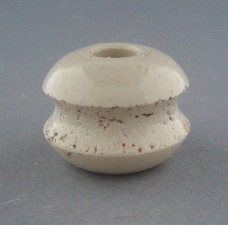 Bobbin insulator; Crown Lynn Technical Ceramics Limited; 1930-1965; 2009.1.1299