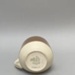 Cup and Saucer - Four Seasons; Crown Lynn Potteries Limited; 1967-1989; 2016.48.13