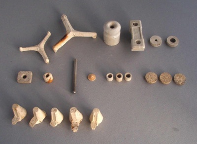 Electrical fittings and other dug material; Crown Lynn Technical Ceramics Limited; 1930-1980; 2009.1.1674.1-21