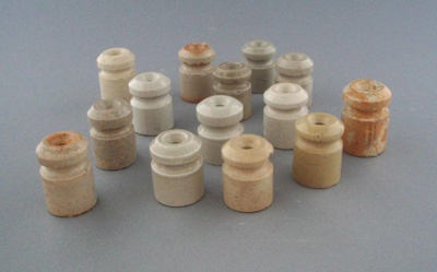 Electric fence insulators; Crown Lynn Technical Ceramics Limited; 1940-1989; 2009.1.1301.1-14