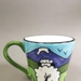 Mug - Smiley Lamb pattern; Studio Ceramics NZ Ltd; 2003-2016; 2017.1.100