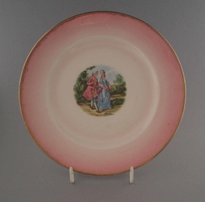 Cake plate - man and woman; Crown Lynn Potteries Limited; 1950-1970; 2009.1.913