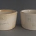 Two electrical insulators; Crown Lynn Technical Ceramics Limited; 1950-1989; 2009.1.1666.1-2