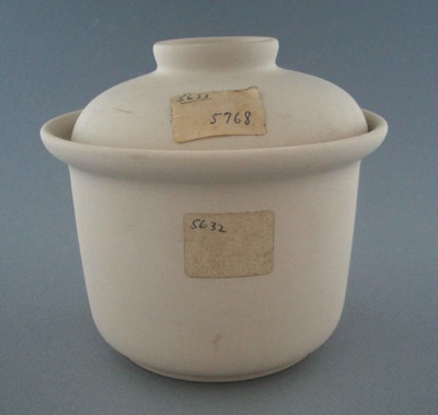 Casserole and lid - bisque; Crown Lynn Potteries Limited; 1977-1989; 2009.1.764.1-2