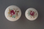 Two handles - Charm pattern; Crown Lynn Technical Ceramics Limited; 1976-1989; 2009.1.1827.1-2
