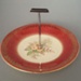 Cake plate and handle - floral; Crown Lynn Potteries Limited; 1950-1970; 2008.1.559.1-2