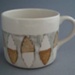 Coffee cup - Image pattern; Crown Lynn Potteries Limited; 1964-1968; 2008.1.2402