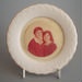 Photo frame - portrait of boy and girl; Crown Lynn Potteries Limited; 1983-1989; 2008.1.286