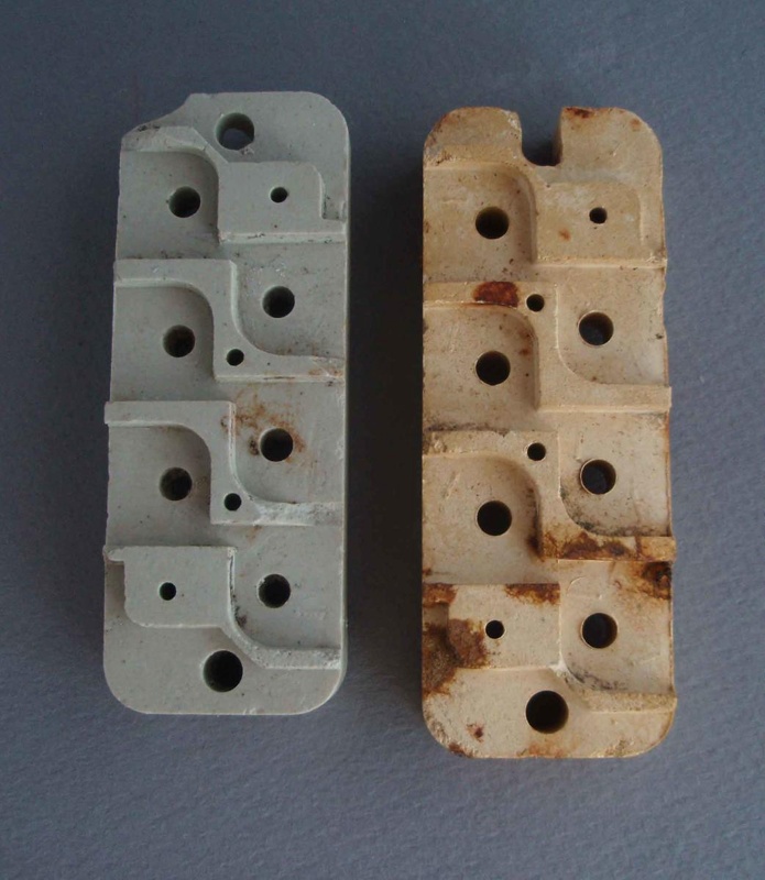 Pair of electrical insulators; Crown Lynn Technical Ceramics Limited; 1940-1960; 2010.1.21.1-2