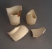 Vase fragments - bisque; Crown Lynn Potteries Limited; 1948-1955; 2009.1.2033.1-4