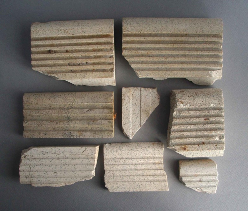 Stair edge tile fragments x8; Crown Lynn Technical Ceramics Limited; 1948-1960; 2009.1.1586.1-8