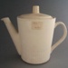 Coffee pot and lid - bisque; Crown Lynn Potteries Limited; 1970-1980; 2008.1.2353.1-2