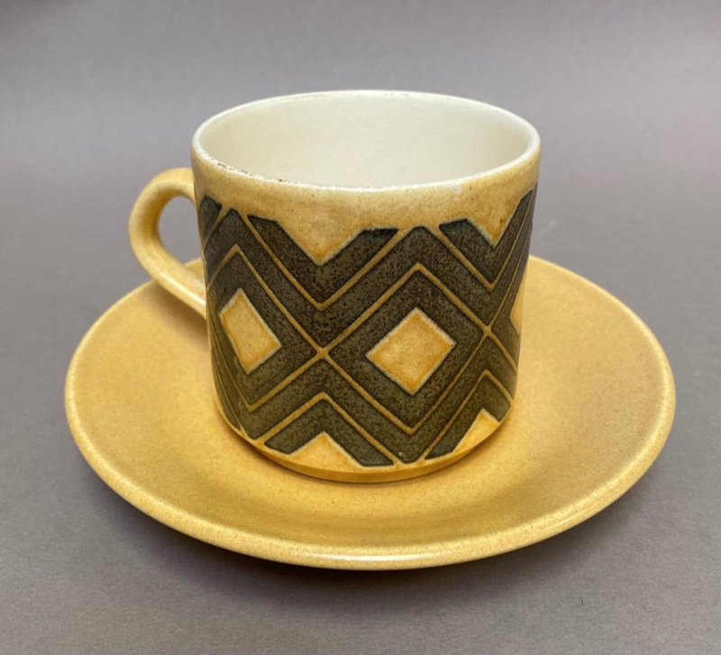 Cup with geometric design and matching saucer.; Crown Lynn Potteries Limited; 1970s; 2016.48.81 Cup with geometric design and matching saucer.; Crown Lynn Potteries Limited; 1970s; 2016.48.81