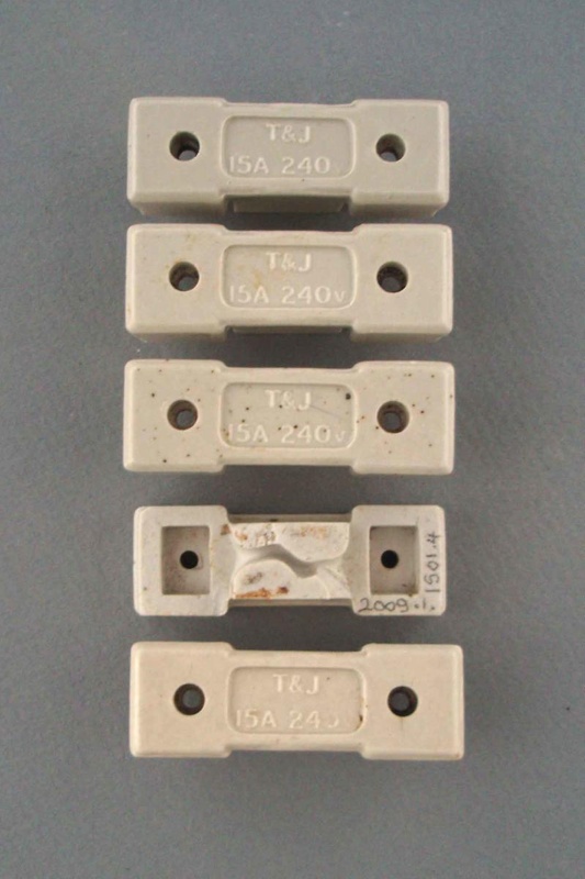 Oven fuse holders - T & J; Crown Lynn Technical Ceramics Limited; 1940-1980; 2009.1.1501.1-5