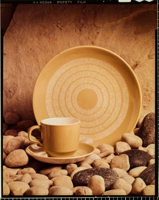 Transparency - Display of cup and saucer and plate in Egmont pattern on rocks; Pre May 1975; 2008.1.2903