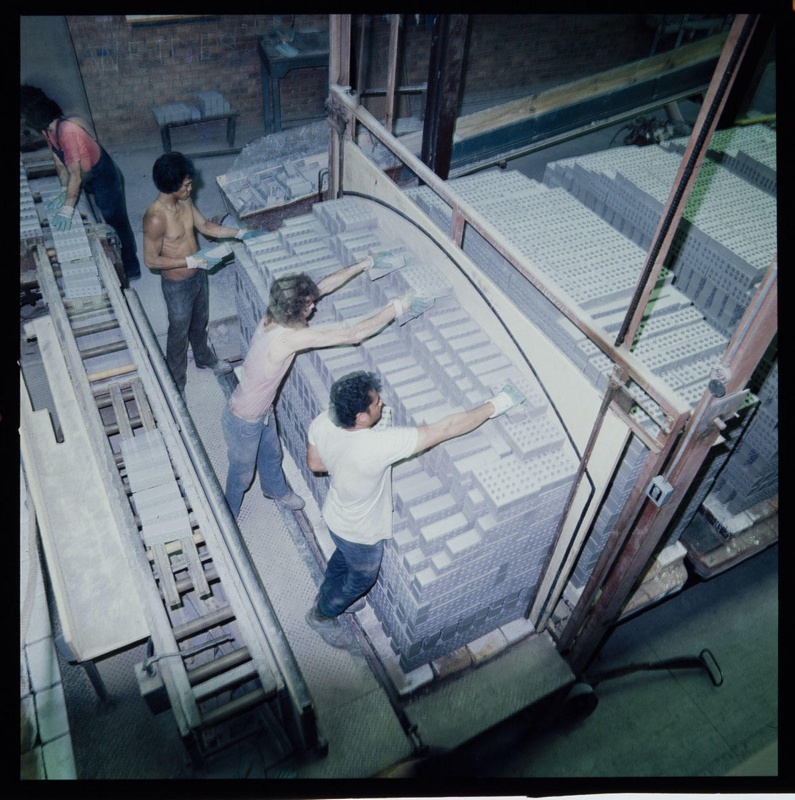 Transparency - Men stacking bricks; Pre May 1975; 2008.1.3228