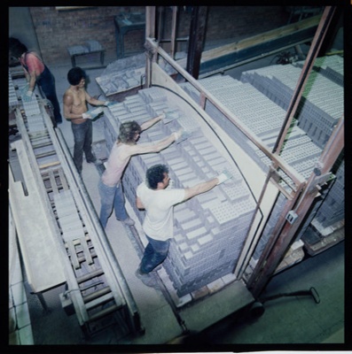 Transparency - Men stacking bricks; Pre May 1975; 2008.1.3228