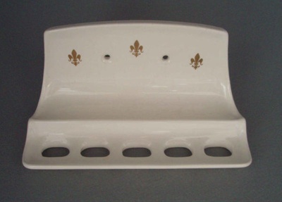 Toothbrush holder - Fleur de lis; Crown Lynn Technical Ceramics Limited; 1968-1988; 2008.1.1348