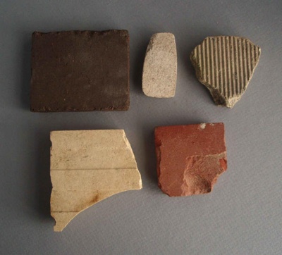Tile fragments x5; Crown Lynn Technical Ceramics Limited; 1940-1970; 2009.1.1591.1-5
