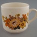 Cup and saucer set with box; Crown Lynn Potteries Limited; 1975-1985; 2008.1.1077.1-13