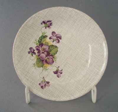 Butter pat - Lilac Time pattern; Crown Lynn Potteries Limited; 1960-1970; 2008.1.947