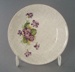 Butter pat - Lilac Time pattern; Crown Lynn Potteries Limited; 1960-1970; 2008.1.947