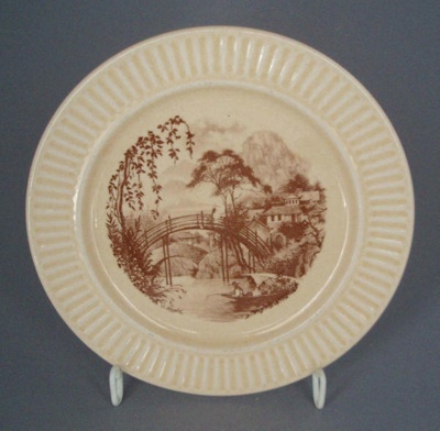 Bread and butter plate - country scene; Crown Lynn Potteries Limited; 1969-1989; 2008.1.1482