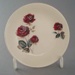 Butter pat - Rose Red pattern; Crown Lynn Potteries Limited; 1967-1975; 2008.1.948