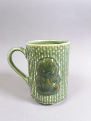 Mug - Hei-Tiki; Studio Ceramics NZ Ltd; 2007; 2017.1.102