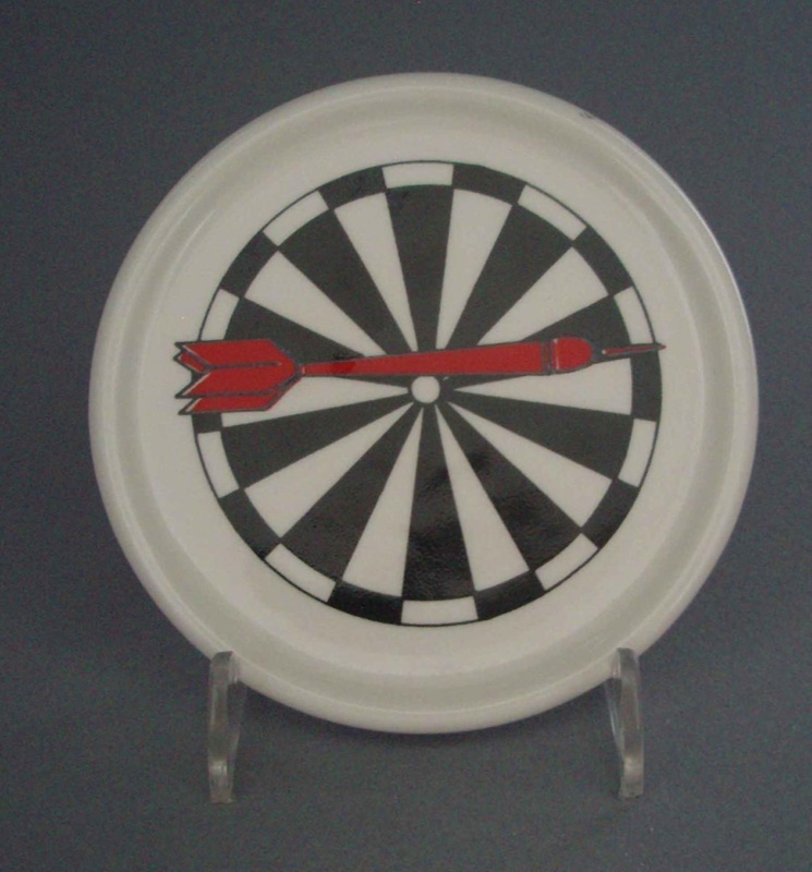 Coaster - darts; Crown Lynn Potteries Limited; 1988-1989; 2008.1.2629