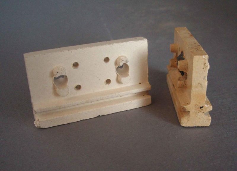 Pair of electrical insulators; Crown Lynn Technical Ceramics Limited; 1940-1970; 2010.1.19.1-2