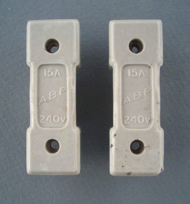 Two oven fuse holders - A.B.P.; Crown Lynn Technical Ceramics Limited; 1940-1980; 2009.1.1495.1-2