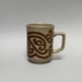 Mug - koru; Crown Lynn Potteries Limited; 2017.32.2