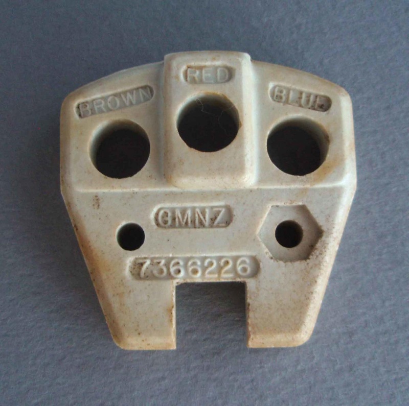 Ceramic insulator for electrical plug; Crown Lynn Technical Ceramics Limited; 1940-1980; 2010.1.28