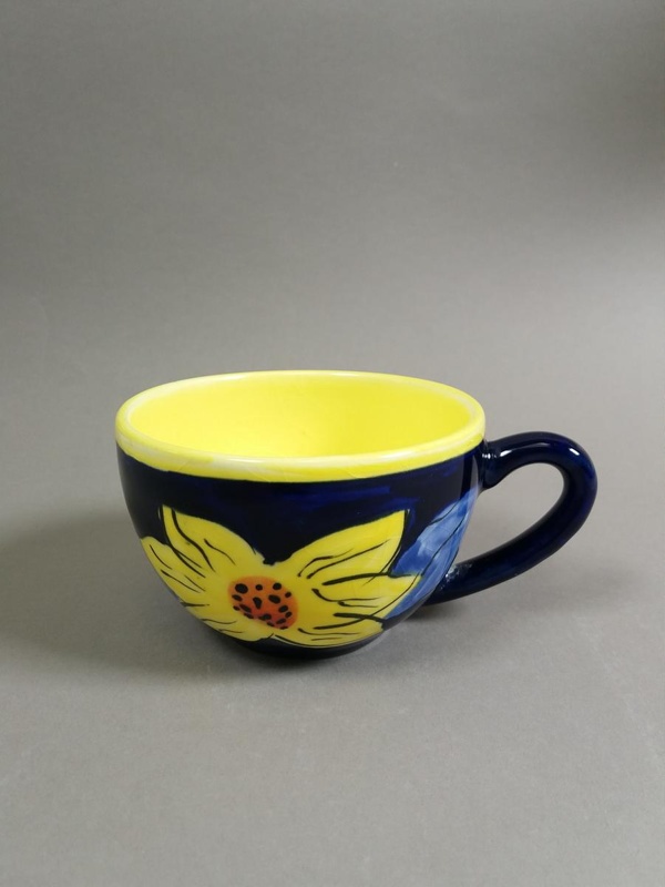 Cup - yellow flowers; Studio Ceramics NZ Ltd; 1991-1995; 2017.1.79