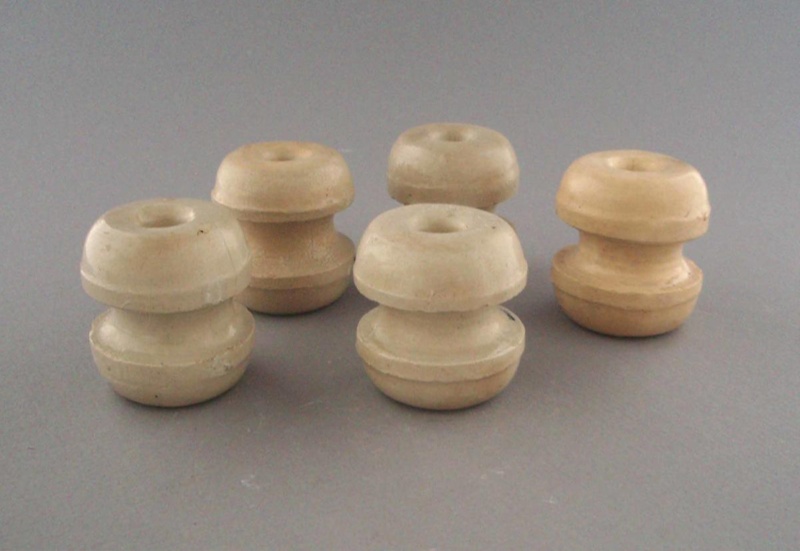 Bobbin insulators; Crown Lynn Technical Ceramics Limited; 1930-1965; 2009.1.1292.1-5