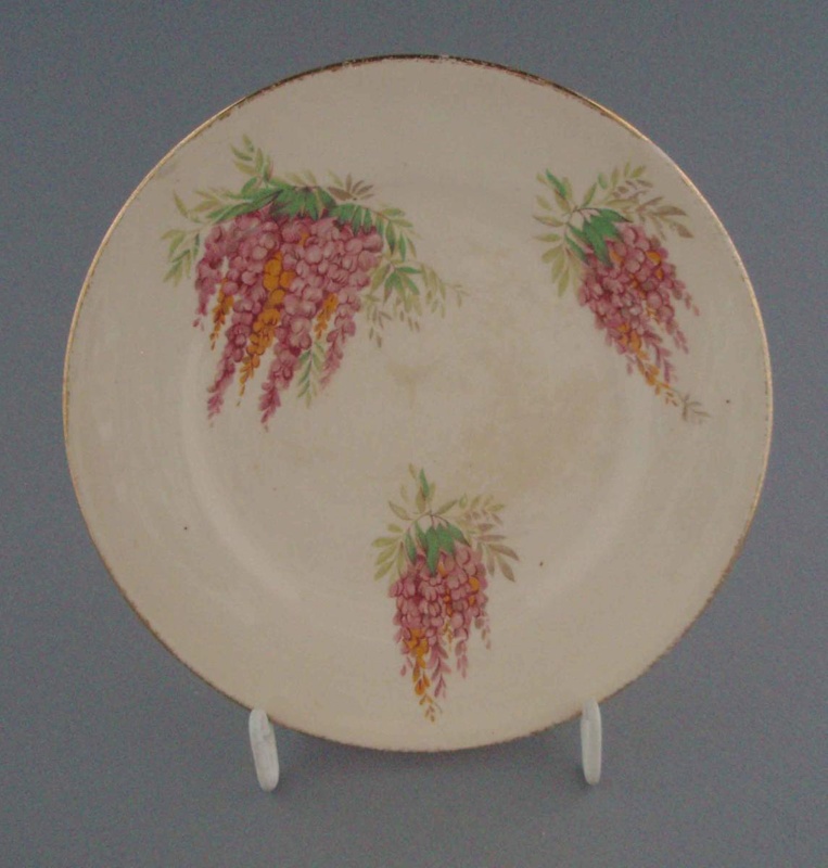 Bread and butter plate - floral; Crown Lynn Potteries Limited; 1948-1955; 2008.1.2000 Bread and butter plate - floral; Crown Lynn Potteries Limited; 1948-1955; 2008.1.2000
