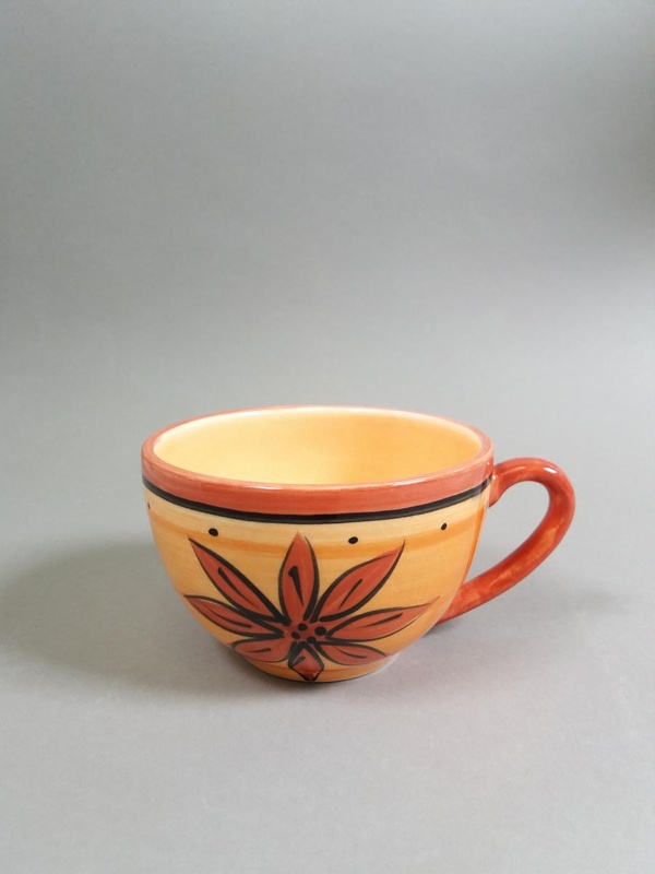 Cup - red flower; Studio Ceramics NZ Ltd; 1998-2004; 2017.1.72