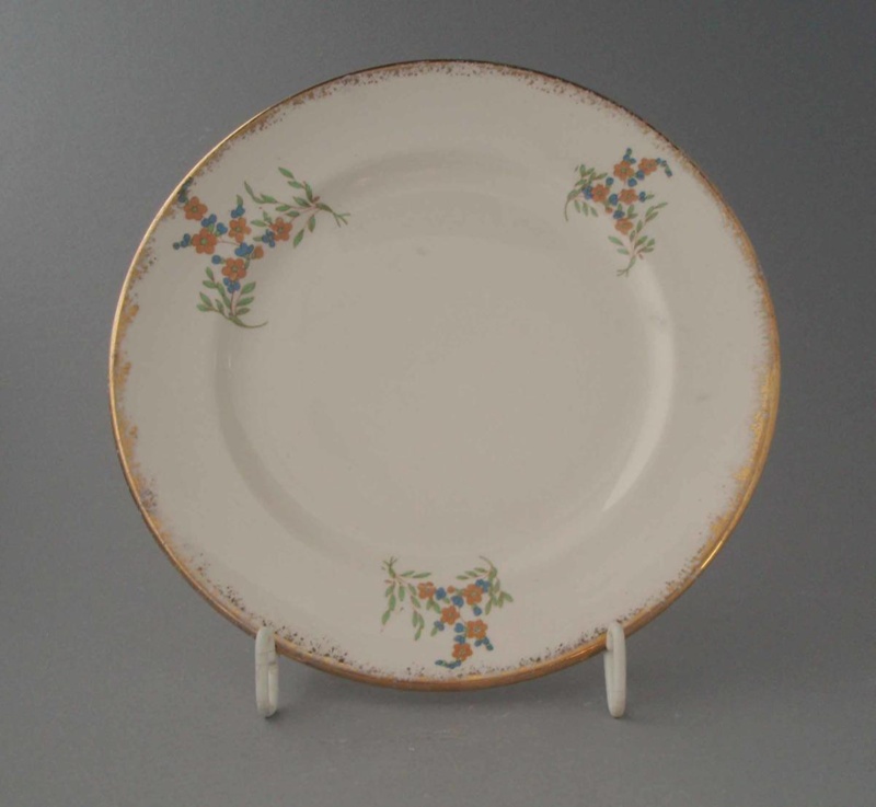 Bread and butter plate - floral; Crown Lynn Potteries Limited; 1960-1970; 2009.1.934 Bread and butter plate - floral; Crown Lynn Potteries Limited; 1960-1970; 2009.1.934