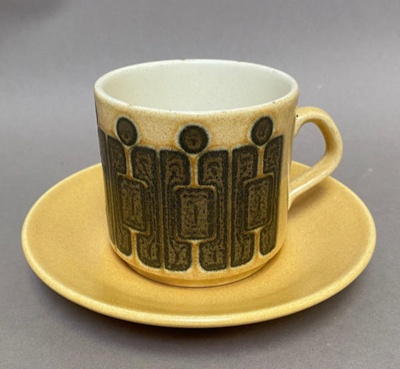 Cup with abstract design and matching saucer.; Crown Lynn Potteries Limited; 1970s; 2016.48.82