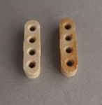 Two electrical insulators; Crown Lynn Technical Ceramics Limited; 1940-1980; 2010.44.1-2