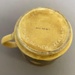 Cup with geometric design and matching saucer.; Crown Lynn Potteries Limited; 1970s; 2016.48.81