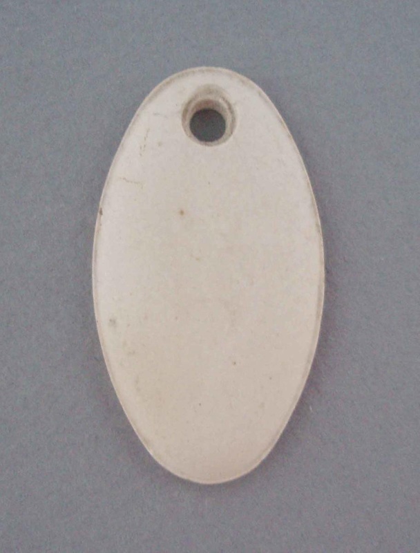 Key hole cover - bisque; Crown Lynn Technical Ceramics Limited; 1965-1985; 2008.1.672