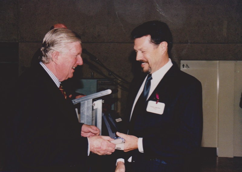 Photograph Colin Munro hands an award to Dennis Gardner at the Dame Mary Durac... eHive