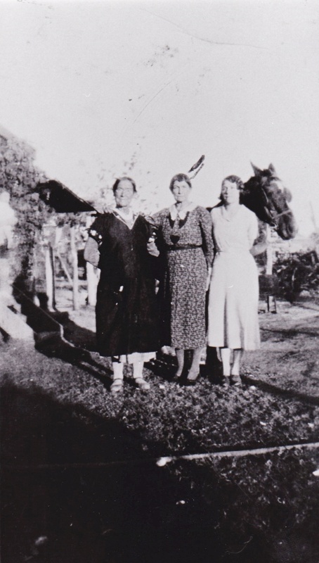 B&W Photograph of three mature women standing in front of building ...